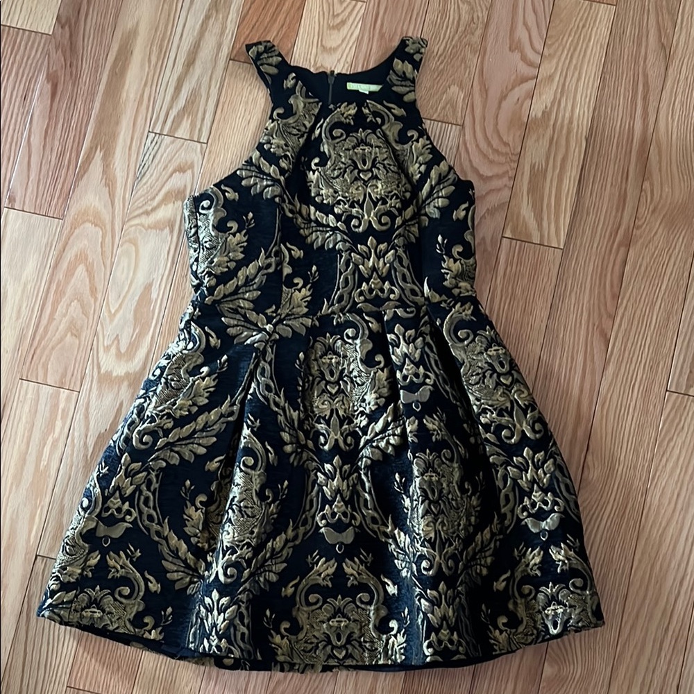 Elegant Black and Gold Mini Dress